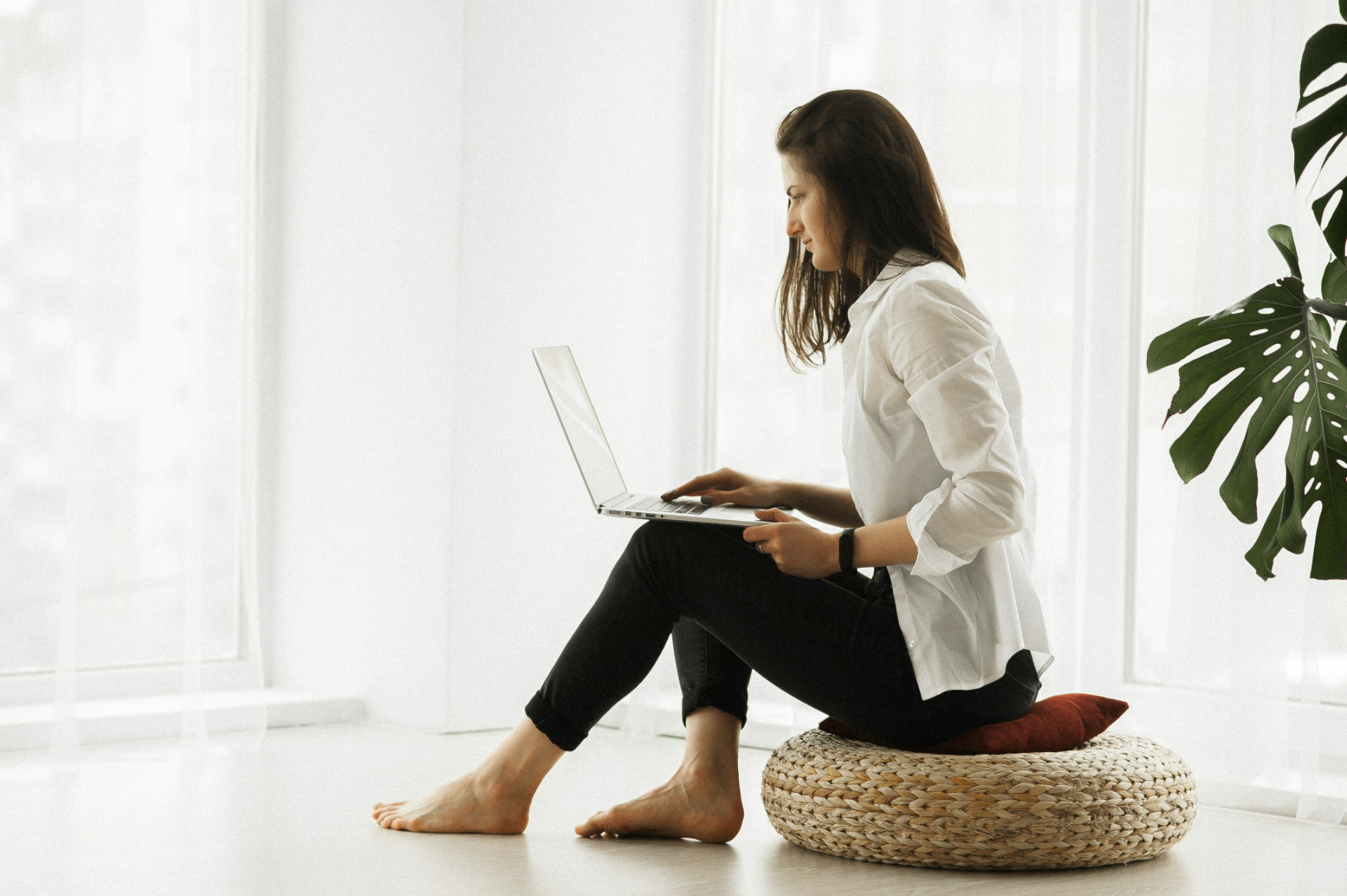 Patient at home joining a telehealth visit on her laptop
